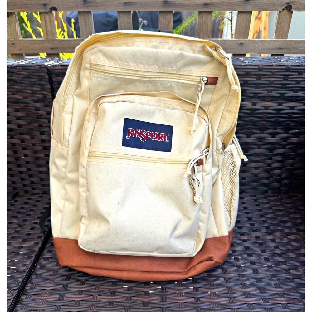 JanSport Beige/Brown Solid Backpack Zip Closure Outer & Bottle Pockets